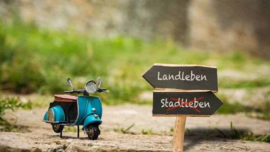 landleben Signposts the direct way to country life versus city life